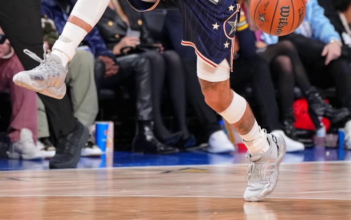 Trae Young's silver adidas sneakers worn in the 2024 NBA All-Star Game.